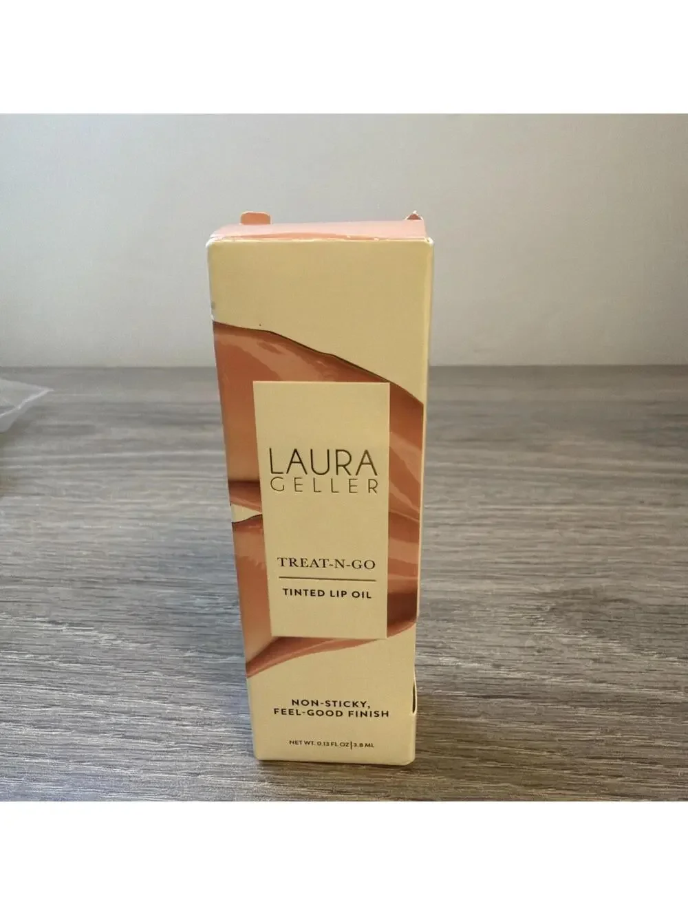 Laura Geller Treat-N-Go Tinted Lip Oil In Finish Line